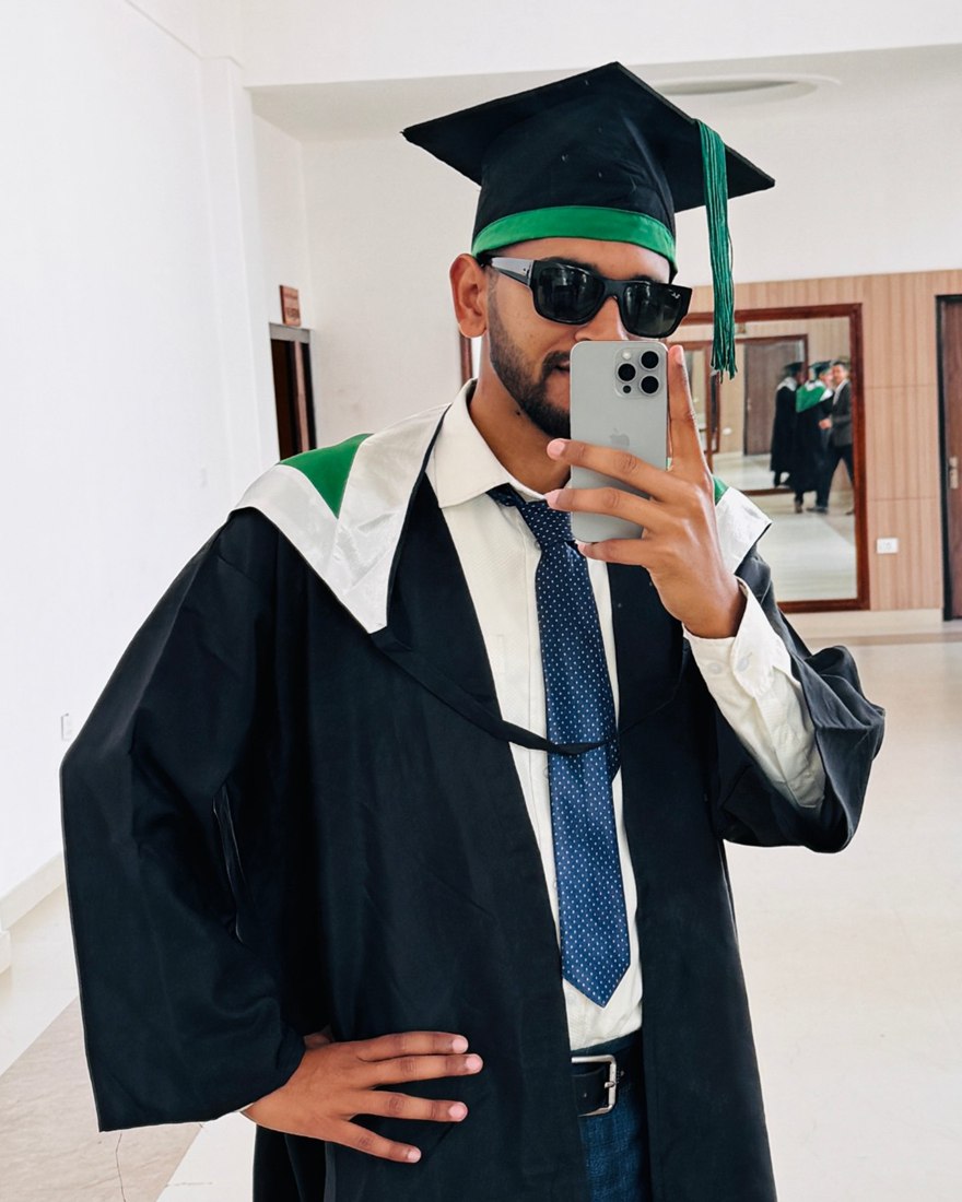 Bijay Raj Poudel in graduation cap and gown